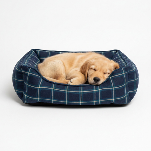 Navy blue checkered square dog bed with a golden retriever puppy resting inside